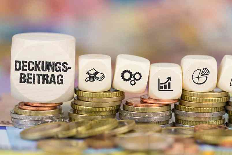 © magele-picture - stock.adobe.com Würfel mit der Aufschrift Deckungsbeitrag
